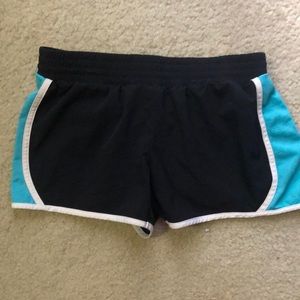 Teal and black athletic shorts